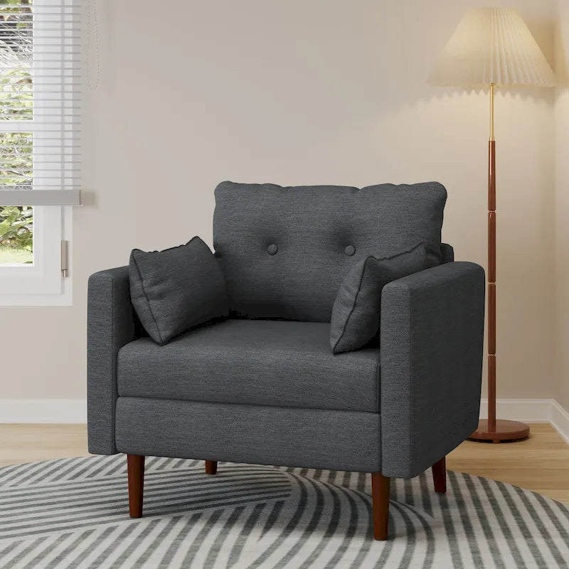 Fauteuil club capitonné avec coussins décoratifs