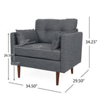 Fauteuil club capitonné avec coussins décoratifs