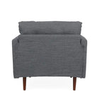 Fauteuil club capitonné avec coussins décoratifs