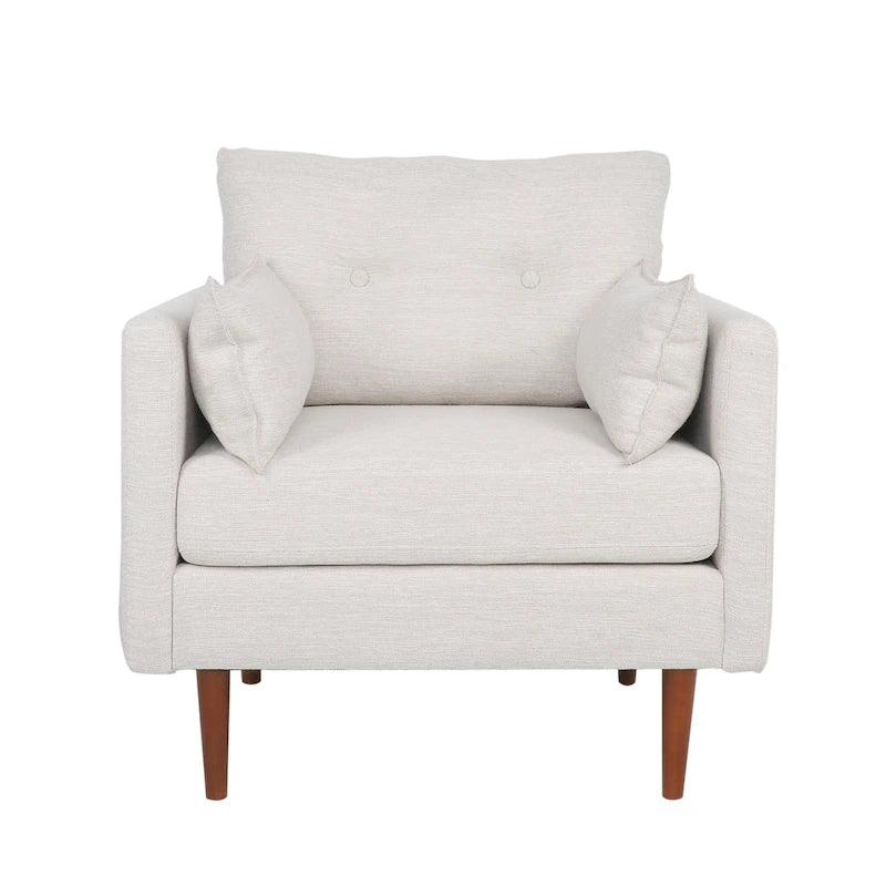 Fauteuil club capitonné avec coussins décoratifs
