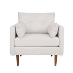 Fauteuil club capitonné avec coussins décoratifs