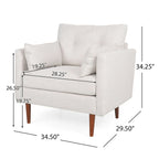 Fauteuil club capitonné avec coussins décoratifs
