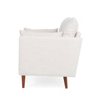 Fauteuil club capitonné avec coussins décoratifs