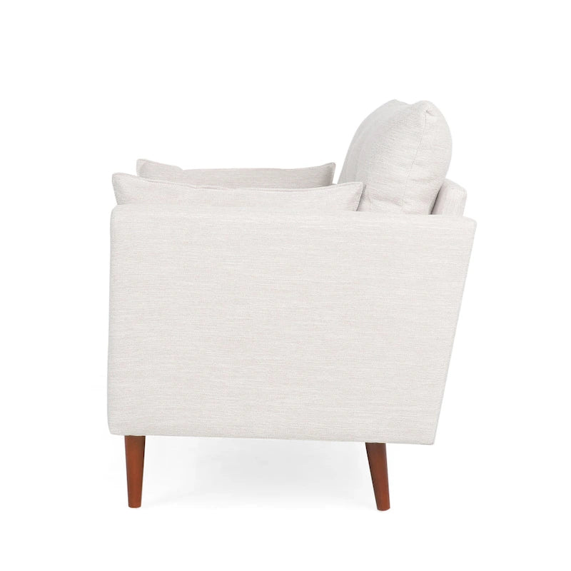 Fauteuil club capitonné avec coussins décoratifs
