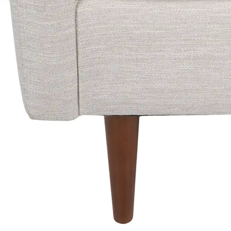 Fauteuil club capitonné avec coussins décoratifs