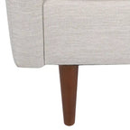 Fauteuil club capitonné avec coussins décoratifs