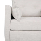 Fauteuil club capitonné avec coussins décoratifs