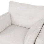 Fauteuil club capitonné avec coussins décoratifs