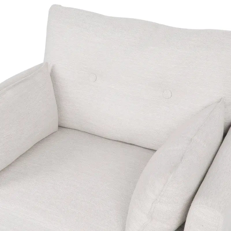 Fauteuil club capitonné avec coussins décoratifs