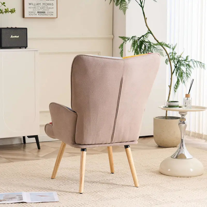 Fauteuil d'appoint capitonné à oreilles avec pieds en hévéa et patins ajustables