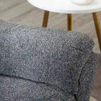 Fauteuil inclinable, pivotant et berçant en tissu avec repose-pieds