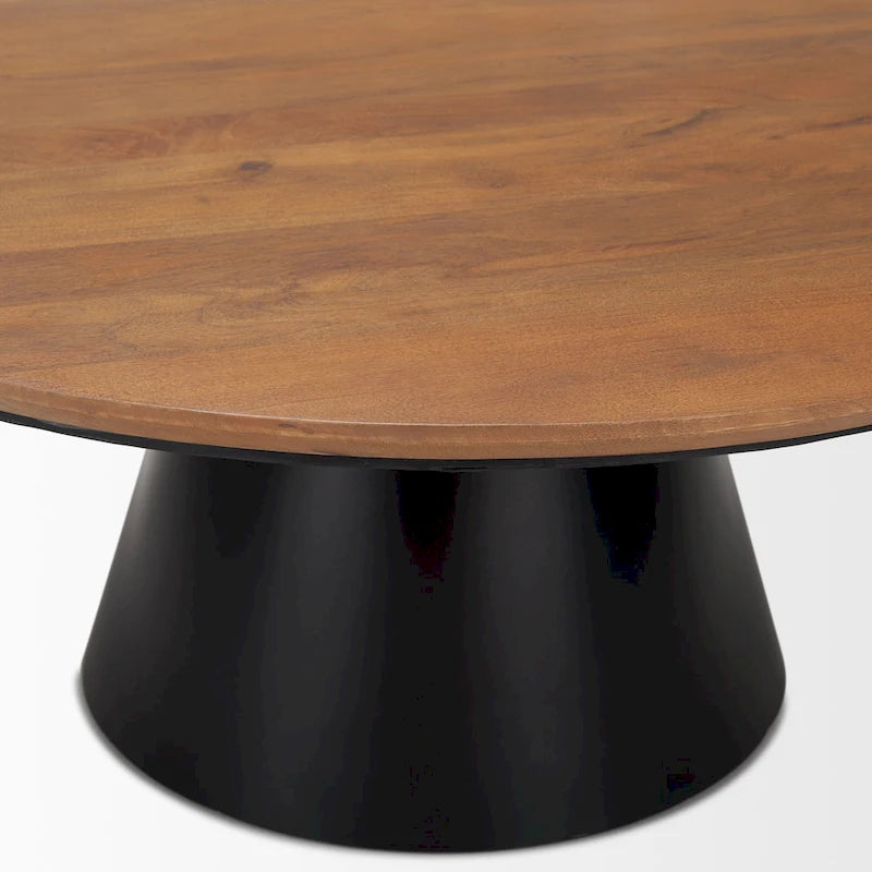 Table basse ronde avec plateau en bois massif et piètement en fonte
