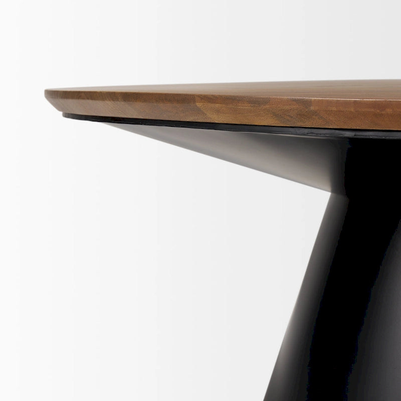 Table basse ronde avec plateau en bois massif et piètement en fonte